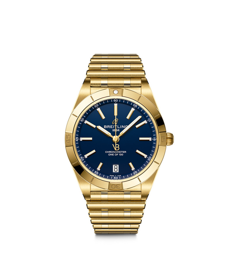 Montre Breitling Chronomat x Victoria Beckham automatique cadran bleu nuit bracelet rouleaux or jaune 18K 36 mm